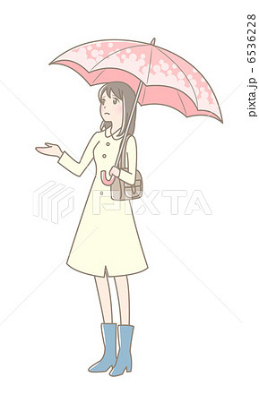 梅雨 女性 白バック 傘 全身の写真素材
