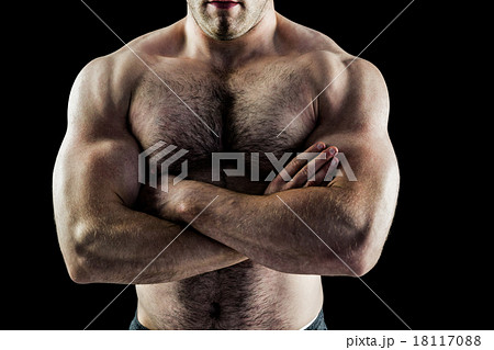 男性 筋肉 腕組みの写真素材