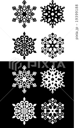 切り絵 雪 結晶 黒背景の写真素材
