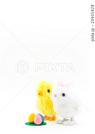 黄色 鳥 おもちゃ 緑の写真素材