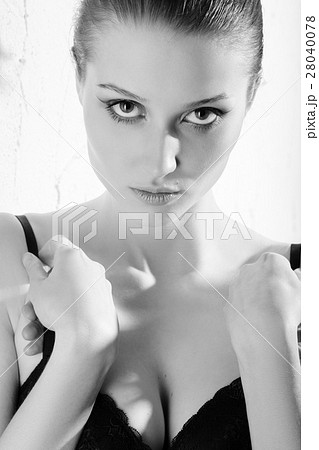 Monochrome Shot of Woman in Underwear Holding Stomach in Pain