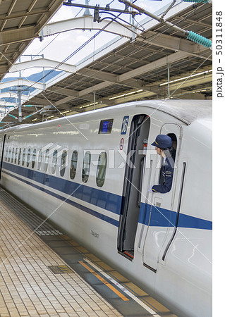 東海道新幹線 車掌 のぞみ 700系の写真素材