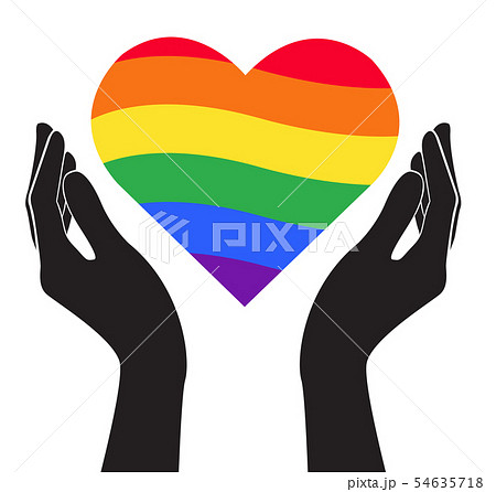 Hand holding rainbow heart on lgbt flag colours, pride month