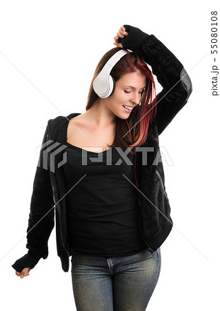 女性 女の子 ヘッドフォン パーカー 音楽の写真素材