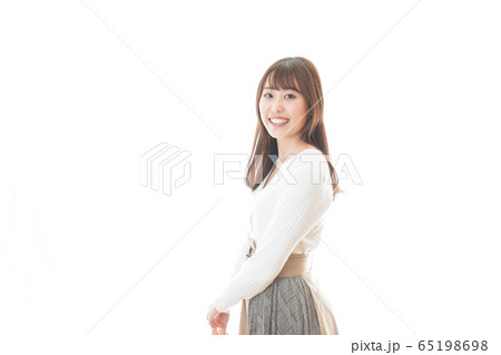 振り向きポーズ 女性の写真素材