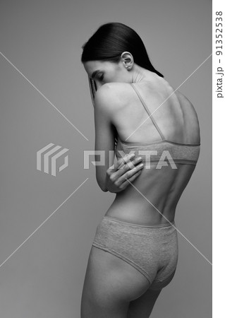 Sexy beautiful woman taking off her lace panties. - Stock Photo [41805449]  - PIXTA